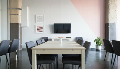 The meeting-room photo the opening scene started from